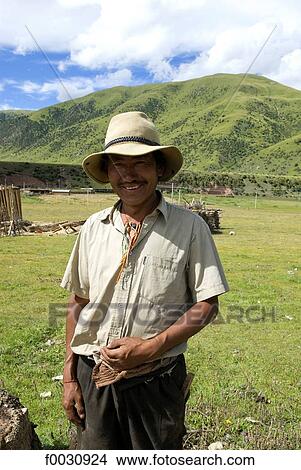 China, Sichuan, between Rongpatsa and Manigango, portrait of a Tibetan View Large Photo Image Picture - China, Sichuan, between Rongpatsa and Manigango, portrait of a Tibetan. Fotosearch