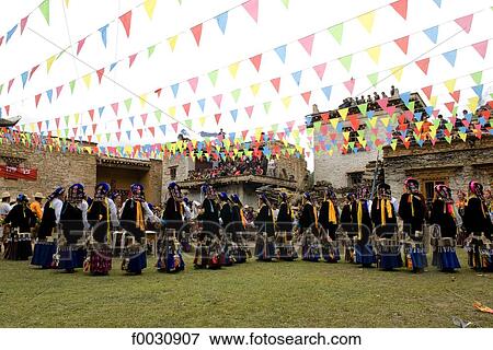 China, Sichuan, near Danba, Tibetan village festival, dance in traditional costume View Large Photo Image Stock Photo - China, Sichuan, near Danba, Tibetan village festival, dance in traditional costume. Fotosearch