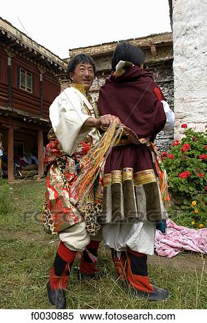 China, Sichuan, near Danba, Tibetan village festival, grooming View Large Photo Image Stock Photography - China, Sichuan, near Danba, Tibetan village festival, grooming. Fotosearch