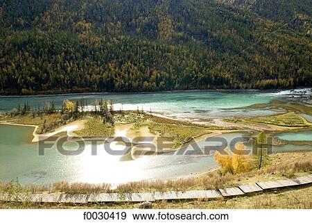 China, Xinjiang, Altay Massif, nature reserve of lake Kanas View Large Photo Image Stock Photo - China, Xinjiang, Altay Massif, nature reserve of lake Kanas. Fotosearch