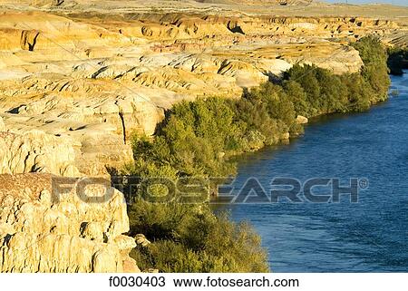 Stock Image - China, Xinjiang, Buerjin River, rocks of 5 colors. Fotosearch