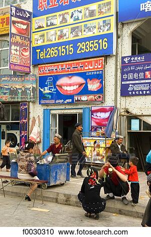 China, Xinjiang, kashgar, ads on building facade View Large Photo Image Stock Image - China, Xinjiang, kashgar, ads on building facade. Fotosearch