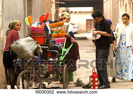 China, Xinjiang, kashgar, old city, itinerant seller View Large Photo Image Stock Image - China, Xinjiang, kashgar, old city, itinerant seller. Fotosearch