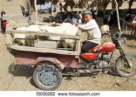 Stock Image - China, Xinjiang, Keriya, market. Fotosearch