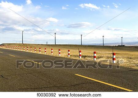 China, Xinjiang, near Buerjin, road and wind turbines View Large Photo Image Stock Image - China, Xinjiang, near Buerjin, road and wind turbines. Fotosearch