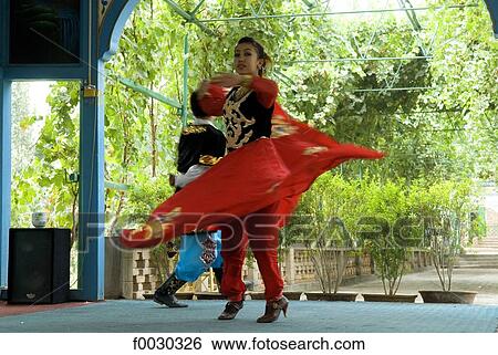 China, Xinjiang, traditional Uyghur dance View Large Photo Image Stock Photograph - China, Xinjiang, traditional Uyghur dance. Fotosearch