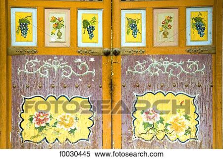 Stock Photography - China, Xinjiang, Turpan, traditional Uyghur dwelling, painted doors. Fotosearch