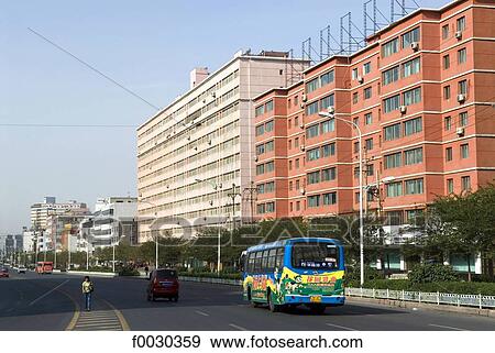 Chine, Xinjiang, Urumqi, road and modern dwelling View Large Photo Image Stock Photo - Chine, Xinjiang, Urumqi, road and modern dwelling. Fotosearch