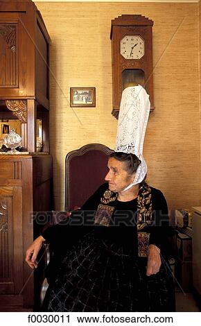 Stock Image - France, Brittany, Pont-l'Abbé, portrait of a Bigouden woman. Fotosearch