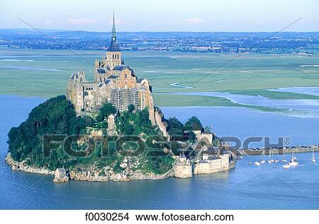 France, Normandy, Mont Saint-Michel by high tide, aerial view View Large Photo Image Picture - France, Normandy, Mont Saint-Michel by high tide, aerial view. Fotosearch
