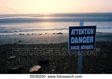France, Normandy, Mont Saint-Michel bay, warning sign View Large Photo Image Stock Image - France, Normandy, Mont Saint-Michel bay, warning sign. Fotosearch