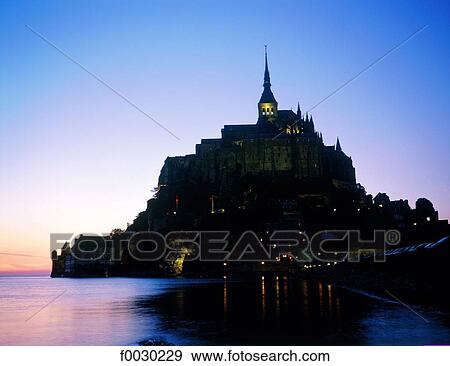 France, Normandy, Mont Saint-Michel, general view at dusk View Large Photo Image Stock Photo - France, Normandy, Mont Saint-Michel, general view at dusk. Fotosearch