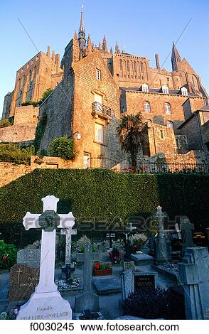 Stock Photography - France, Normandy, Mont Saint-Michel, the abbey viewed from the cimetery. Fotosearch