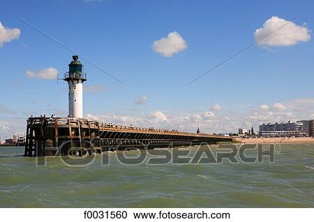 France, Pas-de-Calais, Opal Coast, lighthouse of the port of Calais View Large Photo Image Stock Image - France, Pas-de-Calais, Opal Coast, lighthouse of the port of Calais. Fotosearch