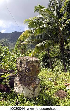 Picture - French Polynesia, Marquesas archipelago, Ua Huka island, village of Hane, old tiki. Fotosearch