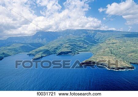 Stock Image - French Polynesia, Marquesas archipelago, Nuku Hiva island, Hatiheu village, aerial view.. Fotosearch