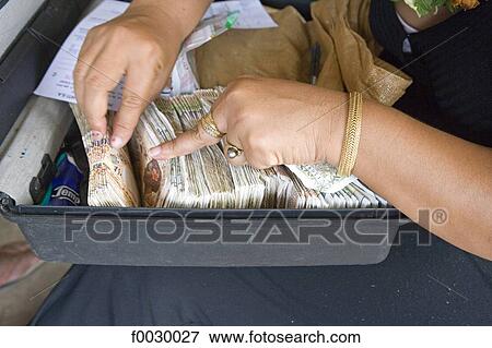 French Polynesia, Marquesas archipelago, Hiva Oa island, Puamau, bundles of Polynesian bills View Large Photo Image Stock Photo - French Polynesia, Marquesas archipelago, Hiva Oa island, Puamau, bundles of Polynesian bills. Fotosearch