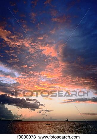 Stock Photo - French Polynesia, Moorea island, sunset. Fotosearch