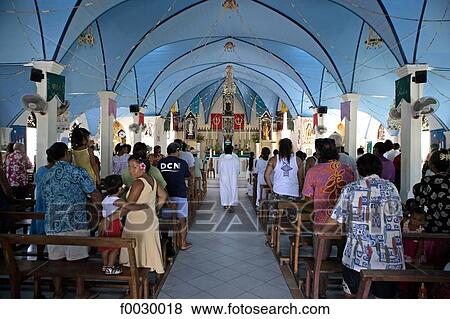 Stock Photo - French Polynesia, Tuamotus, Fakarava, sunday mass. Fotosearch