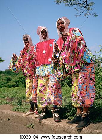 Grenada, Grande anse, men disguised as pierrots (local french name) during the carnival View Large Photo Image Picture - Grenada, Grande anse, men disguised as pierrots (local french name) during the carnival. Fotosearch