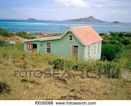 Grenada, the Grenadines, Carriacou island, local house in front of Petit-Martinique islet View Large Photo Image Stock Photo - Grenada, the Grenadines, Carriacou island, local house in front of Petit-Martinique islet. Fotosearch