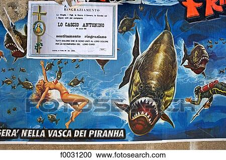 Stock Image - Italy, Sicily, Castel di Tusa, poster announcing the death of a local citizen. Fotosearch