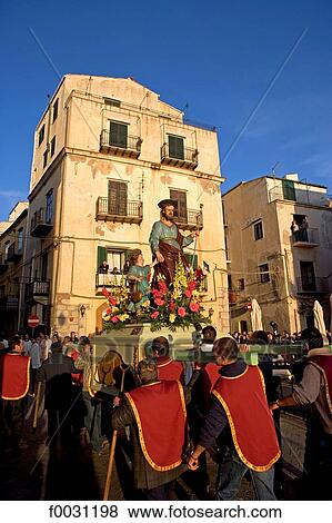 Stock Photo - Italy, Sicily, Cefalu, the procession of San Giuseppe. Fotosearch