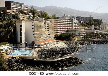 Portugal, Madeira, Funchal, hotel and swimming pool View Large Photo Image Stock Image - Portugal, Madeira, Funchal, hotel and swimming pool. Fotosearch