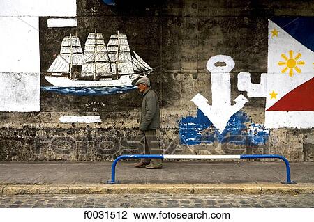 Portugal, Madeira, Funchal, man by a painting wall View Large Photo Image Stock Image - Portugal, Madeira, Funchal, man by a painting wall. Fotosearch