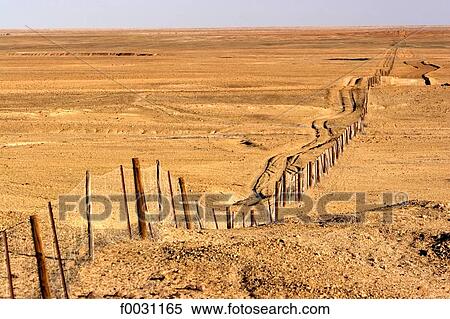 South Australia, Simpson desert, dingo fence View Large Photo Image Stock Photography - South Australia, Simpson desert, dingo fence. Fotosearch