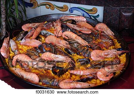 Stock Image - Spain, Valencia, paella. Fotosearch