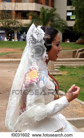 Spain, Valencia, young girl in costume during the celebration of the Virgin View Large Photo Image Stock Image - Spain, Valencia, young girl in costume during the celebration of the Virgin. Fotosearch