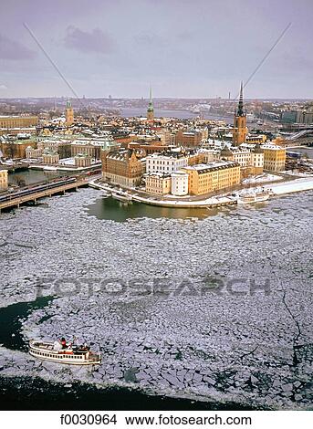 Sweden, Stockholm, Gamla Stan: old city, overview on Riddarholmen island in winter View Large Photo Image Picture - Sweden, Stockholm, Gamla Stan: old city, overview on Riddarholmen island in winter. Fotosearch