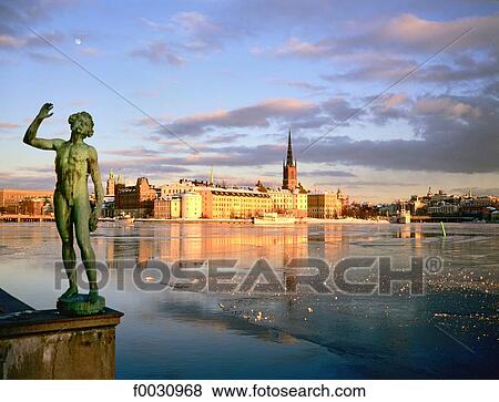 Sweden, Stockholm, Gamla Stan: old city, Riddarholmen island view from the city hall in winter View Large Photo Image Stock Photo - Sweden, Stockholm, Gamla Stan: old city, Riddarholmen island view from the city hall in winter. Fotosearch