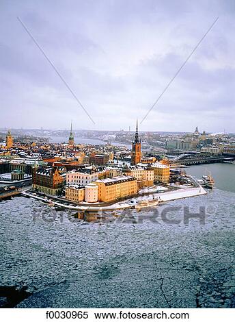 Stock Photography - Sweden, Stockholm, Gamla Stan: old city, overview on Riddarholmen island in winter. Fotosearch