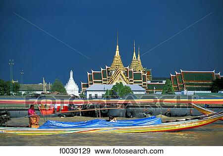 Thailand, Bangkok, Chao Praya river, barge and water taxi by a temple View Large Photo Image Stock Photo - Thailand, Bangkok, Chao Praya river, barge and water taxi by a temple. Fotosearch