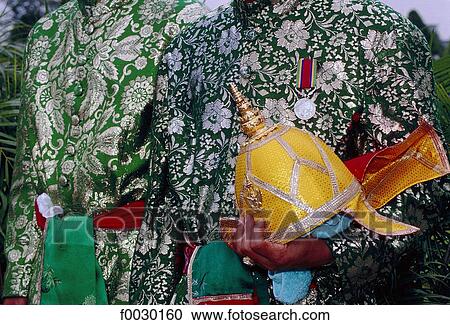 Thailand, Bangkok, festival dress for a rower on a royal barge View Large Photo Image Stock Image - Thailand, Bangkok, festival dress for a rower on a royal barge. Fotosearch