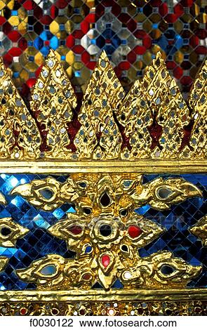 Thailand, Bangkok, Grand Palace and emerald Buddha temple "Wat Phra Keo", close-up on a carved frieze with colored glass View Large Photo Image Stock Image - Thailand, Bangkok, Grand Palace and emerald Buddha temple "Wat Phra Keo", close-up on a carved frieze with colored glass. Fotosearch