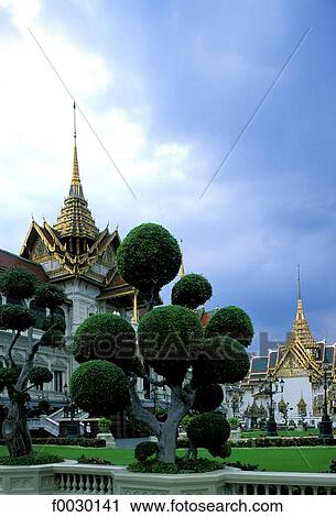 Thailand, Bangkok, Grand Palace and emerald Buddha temple "Wat Phra Keo", sculpted boxtrees View Large Photo Image Stock Image - Thailand, Bangkok, Grand Palace and emerald Buddha temple "Wat Phra Keo", sculpted boxtrees. Fotosearch