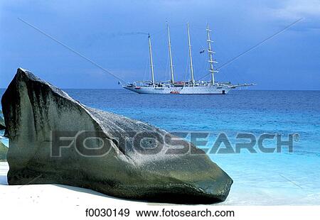Thailand, Koh Miang island, beach and lagoon, granite rock and cruise boat lying at anchor View Large Photo Image Stock Photo - Thailand, Koh Miang island, beach and lagoon, granite rock and cruise boat lying at anchor. Fotosearch