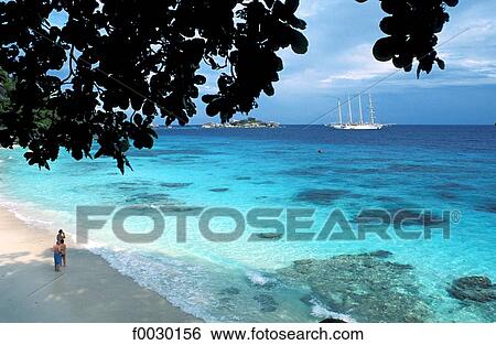 Thailand, Koh Miang island, beach and lagoon, cruise boat lying at anchor View Large Photo Image Stock Photograph - Thailand, Koh Miang island, beach and lagoon, cruise boat lying at anchor. Fotosearch