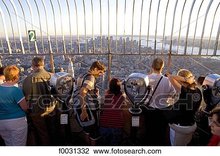 United States, New York, Manhattan, on top of the Empire State Building, general view and tourists View Large Photo Image Stock Image - United States, New York, Manhattan, on top of the Empire State Building, general view and tourists. Fotosearch
