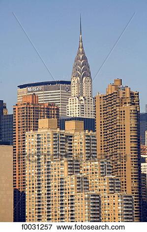 United States, New York, Manhattan, habitations buildings and Chrysler Building at back View Large Photo Image Stock Photo - United States, New York, Manhattan, habitations buildings and Chrysler Building at back. Fotosearch