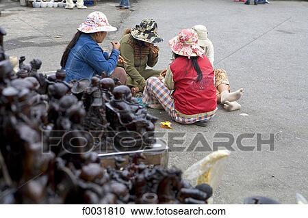 Vietnam, Clouds Pass road, women eating on the road. View Large Photo Image Stock Image - Vietnam, Clouds Pass road, women eating on the road.. Fotosearch