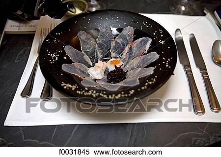 Stock Photography - Vietnam, Hanoi, fish dish.. Fotosearch