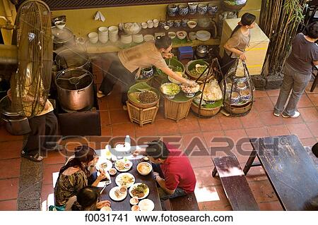 Stock Image - Vietnam, Ho Chi Minh city, restaurant.. Fotosearch