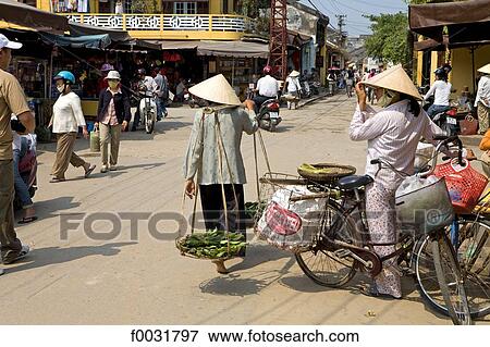 Stock Photo - Vietnam, Hoi An, lively street.. Fotosearch