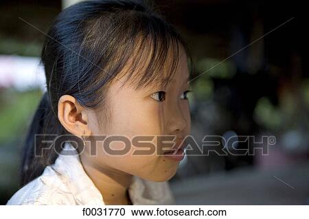 Vietnam, village by Mang Thit river, portrait of a young girl. View Large Photo Image Stock Image - Vietnam, village by Mang Thit river, portrait of a young girl.. Fotosearch