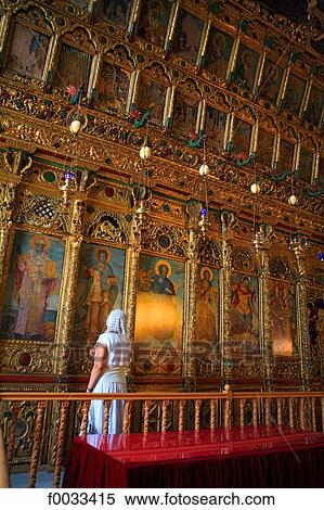 Stock Photography - Cyprus, Larnaca, woman inside Agios Lazaros church. Fotosearch