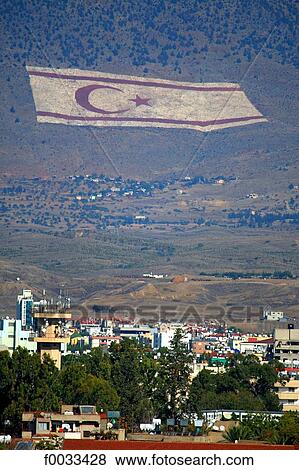 Stock Photo - Cyprus, Nicosia, painted flag on the mountain. Fotosearch